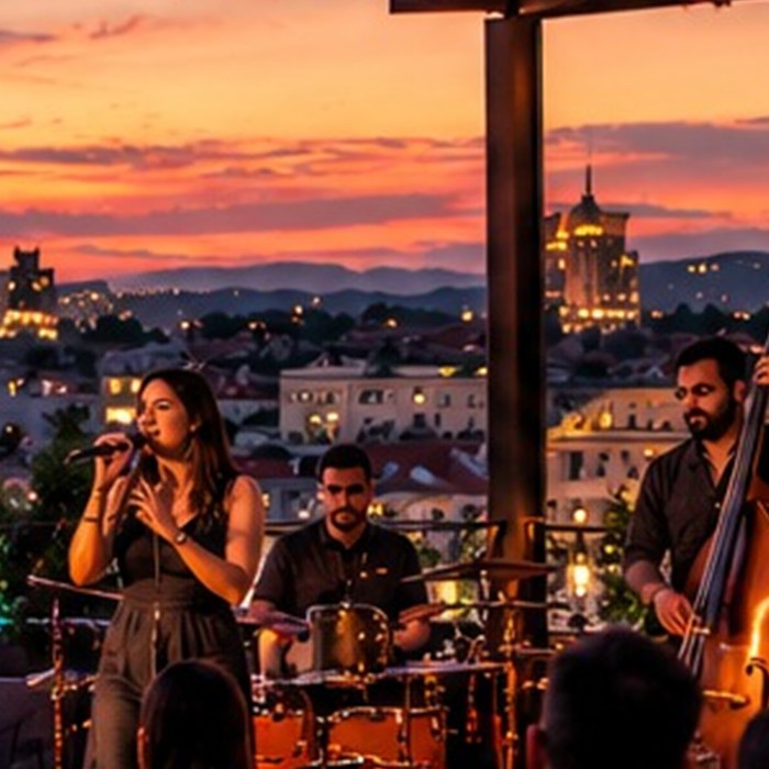 Bend svira live muziku na terasi u sumrak